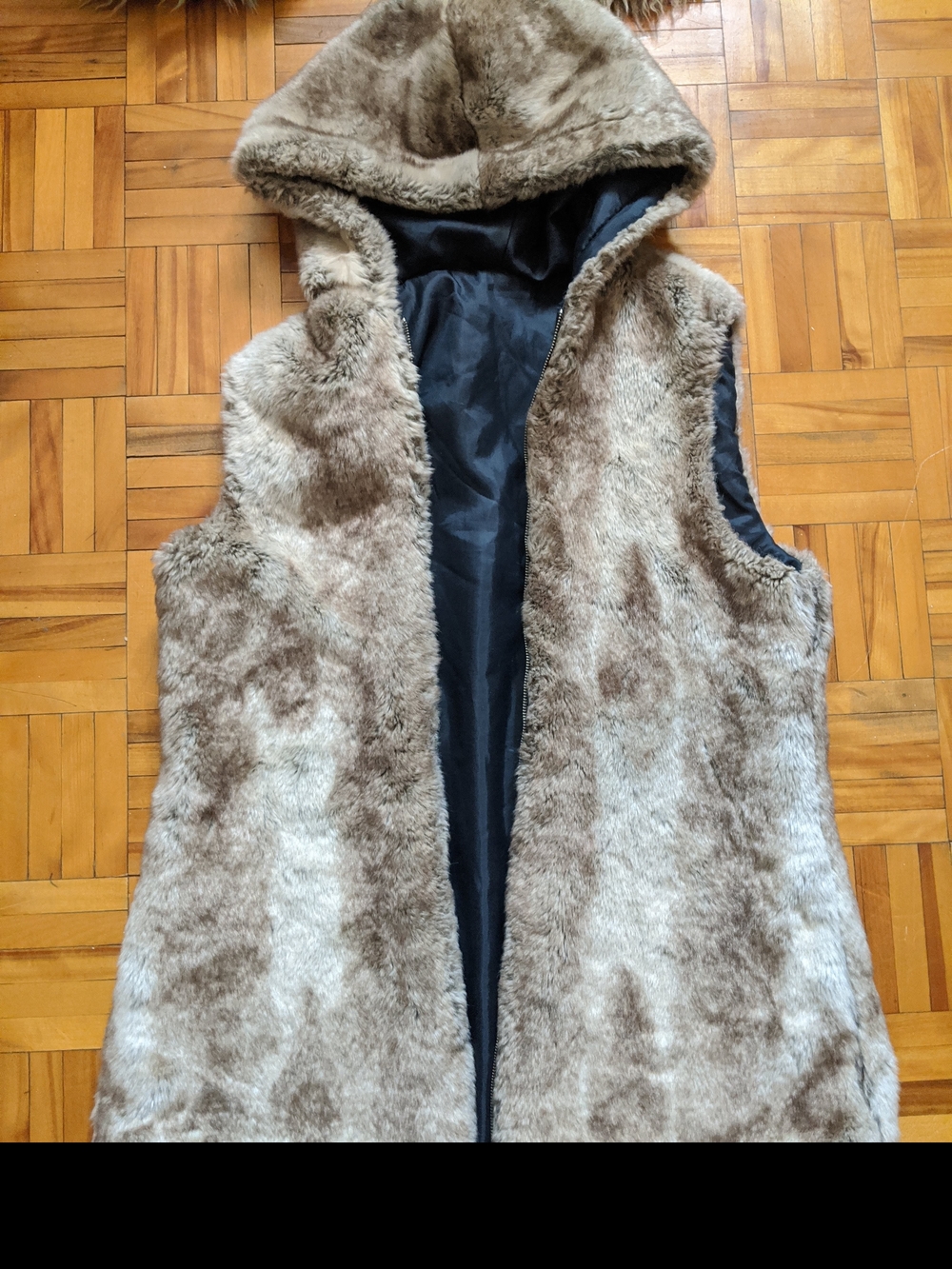 Realistic And Cozy Faux Fur Hooded Vest